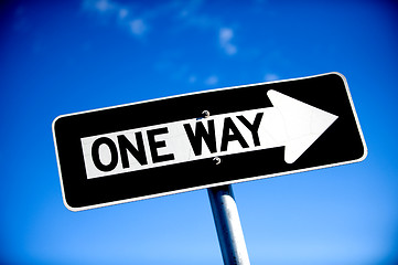 Image showing One Way Sign with blue sky