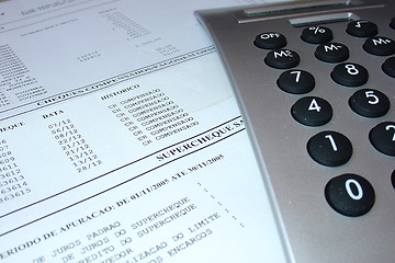 Image showing Bank statement with calculator