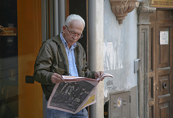 Image showing Man reading newspaper