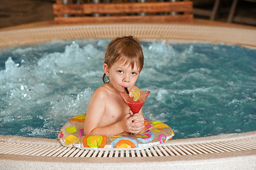 Image showing Boy with glass of coctail