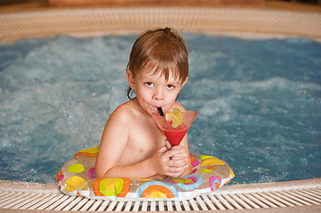Image showing Boy with glass of coctail
