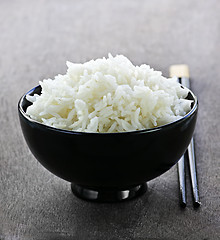 Image showing Rice bowl with chopsticks