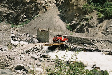 Image showing jeep crossing stream