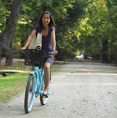 Image showing Woman Riding A Bicycle