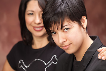 Image showing Attractive Multiethnic Mother and Daughter Portrait