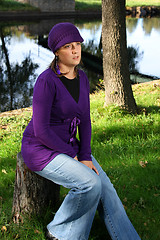 Image showing  beautiful woman in an autumn park 