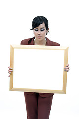 Image showing Young woman holding blank board