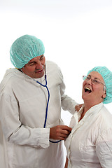 Image showing mature doctor couple, team of doctors, healthcare photo