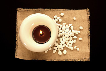 Image showing candles and massage stones in a calm zen spa