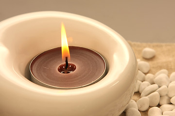 Image showing candles and massage stones in a calm zen spa