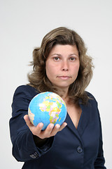 Image showing young pretty woman with Earth