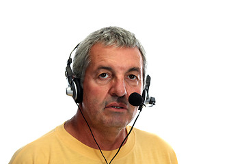 Image showing mature man in a business call center