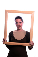 Image showing Portrait of a beautiful young woman with frame