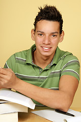 Image showing Young student studying at home