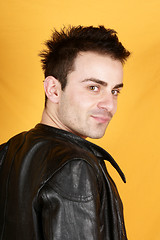 Image showing Young man with black leather jacket