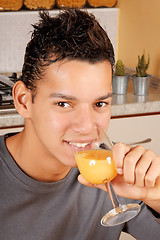 Image showing Young man drinking