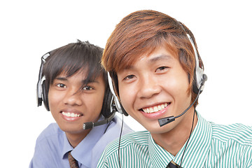 Image showing Two Asian call center agents