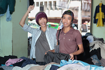 Image showing Asian teens shopping in oriental bazaar