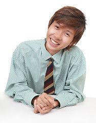 Image showing Convincing Asian salesman