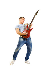 Image showing Passionate guitarist playing isolated on white