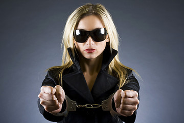 Image showing woman with handcuffs on