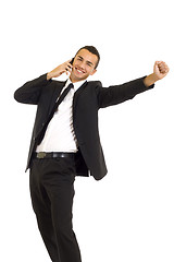 Image showing  young business man discussing on a cell phone