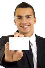 Image showing Business man handing a blank business card 