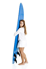 Image showing Woman with a surfboard