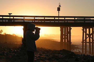 Image showing Photographer At Sunset