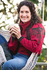 Image showing Mature woman drinking coffee