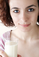 Image showing Young people eating milk with cereals