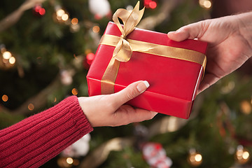 Image showing Man and Woman Gift Exchange