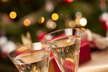 Image showing Sparkling Champagne Flutes and Gifts