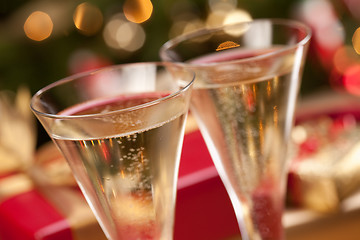 Image showing Sparkling Champagne Flutes and Gifts