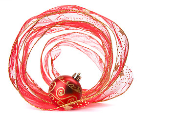 Image showing   Red Xmas bauble in a red ribbon Spiral