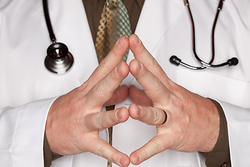 Image showing Doctor with Stethoscope Making Hand Gestures