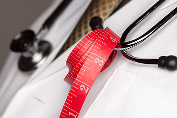 Image showing Doctor with Stethoscope and Measuring Tape