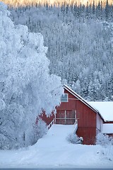 Image showing Red barn in winter