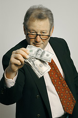 Image showing executive with cash