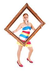 Image showing Pretty girl in colorful dress.