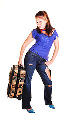 Image showing Girl on a trip with suitcase.