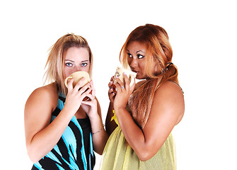 Image showing Two girls drinking coffee.