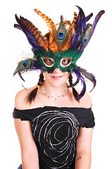 Image showing Young girl with feather mask.