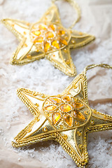 Image showing Golden star shape Christmas decorations