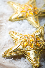Image showing Golden star shape Christmas decorations