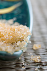 Image showing Bath salt on a green dish