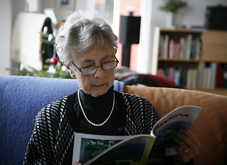 Image showing Senior female reading