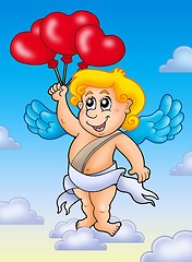 Image showing Cupid with balloons on blue sky