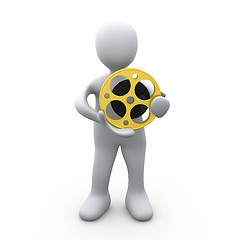 Image showing Person Holding A Film Reel