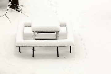 Image showing Little table covered with powder snow